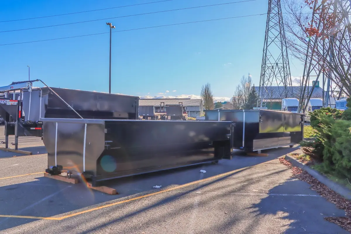 Roll-off dumpster ready for waste disposal at job site for Demolition Dumpster Rental in Granby